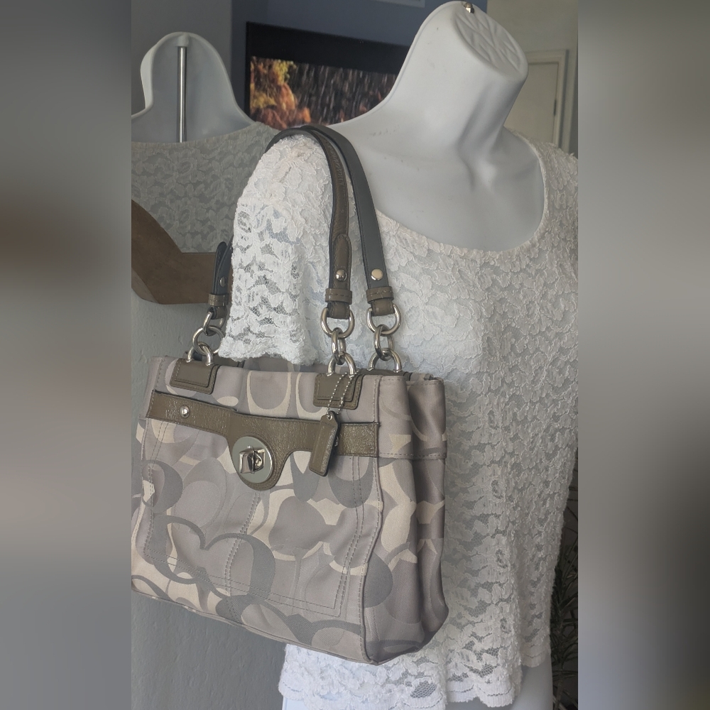 Coach  Penelope Gray Canvas Signature Handbag .